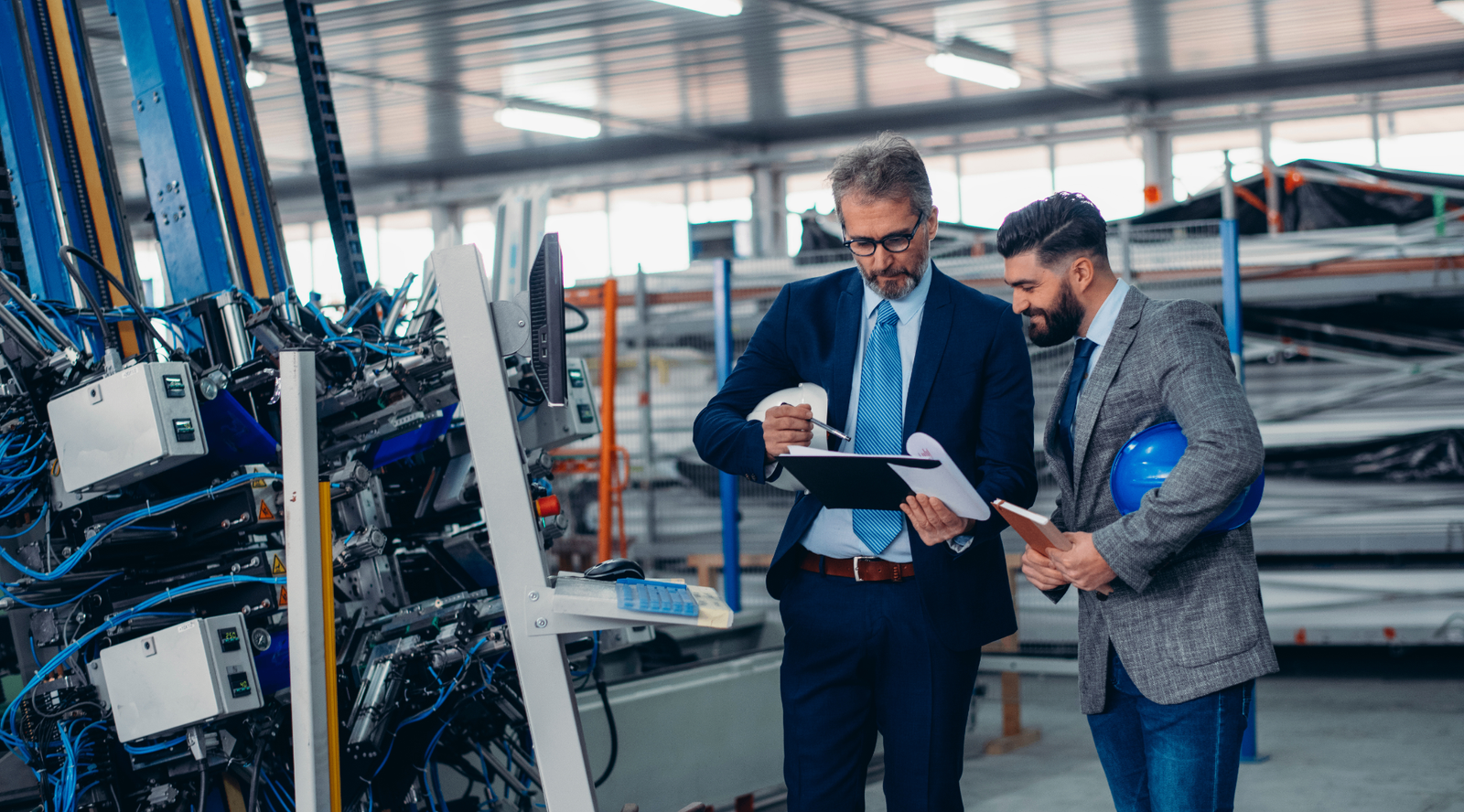 Team members inspecting equipment in the facility